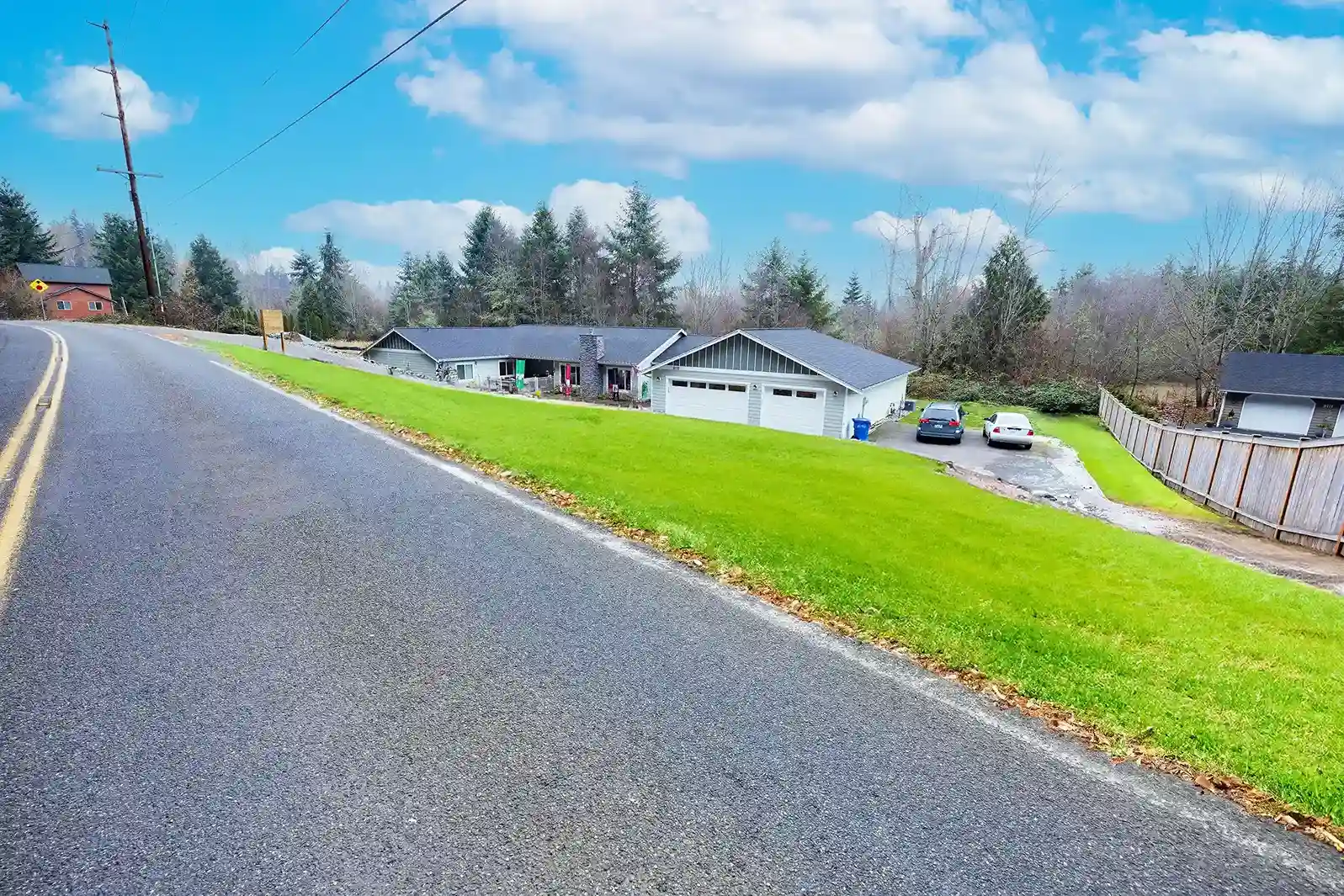 greenery and beauty outside caring arms of bonney lake's assisted living community