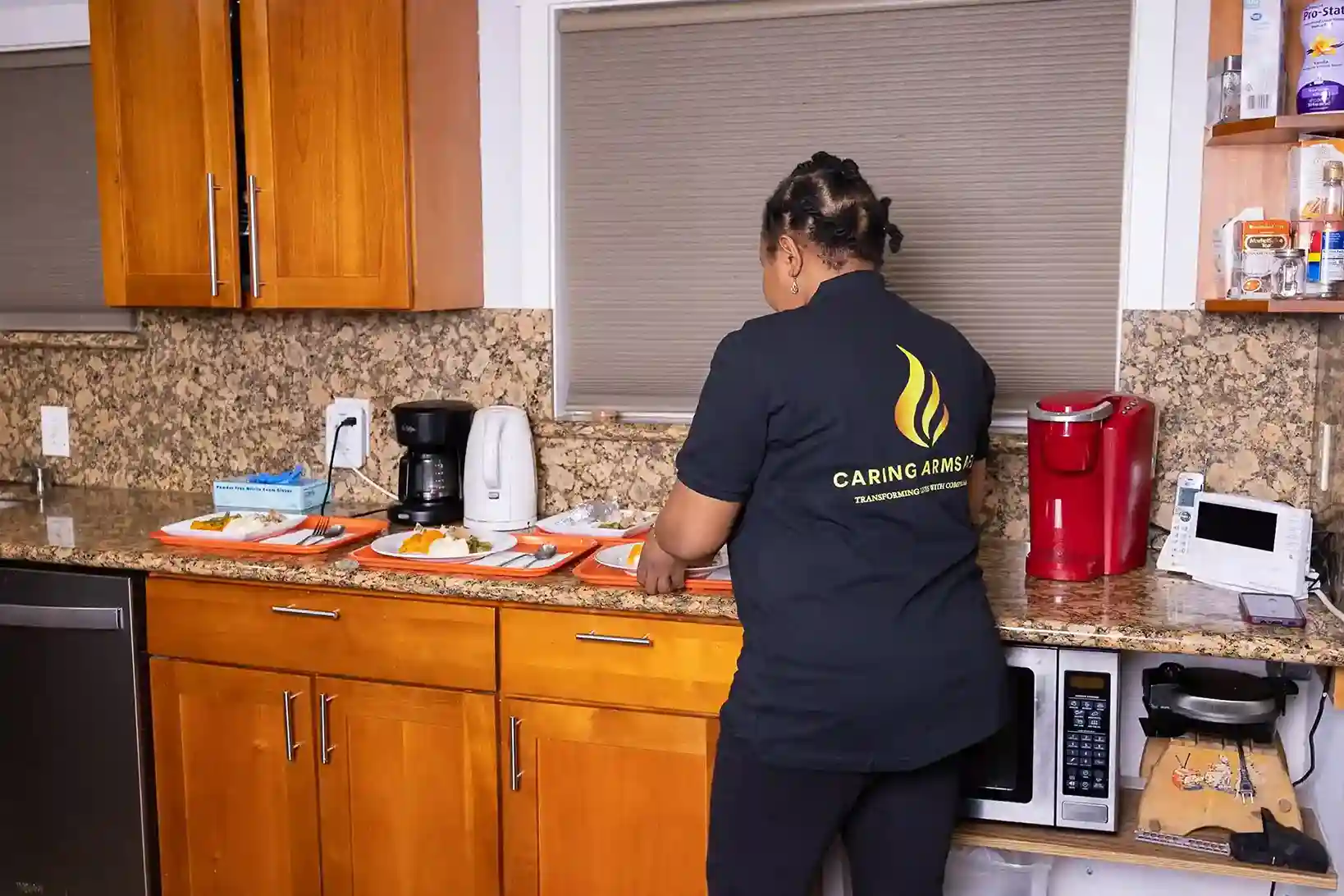 Des Moines Assisted Living Home's staff in action making healthy food for residents
