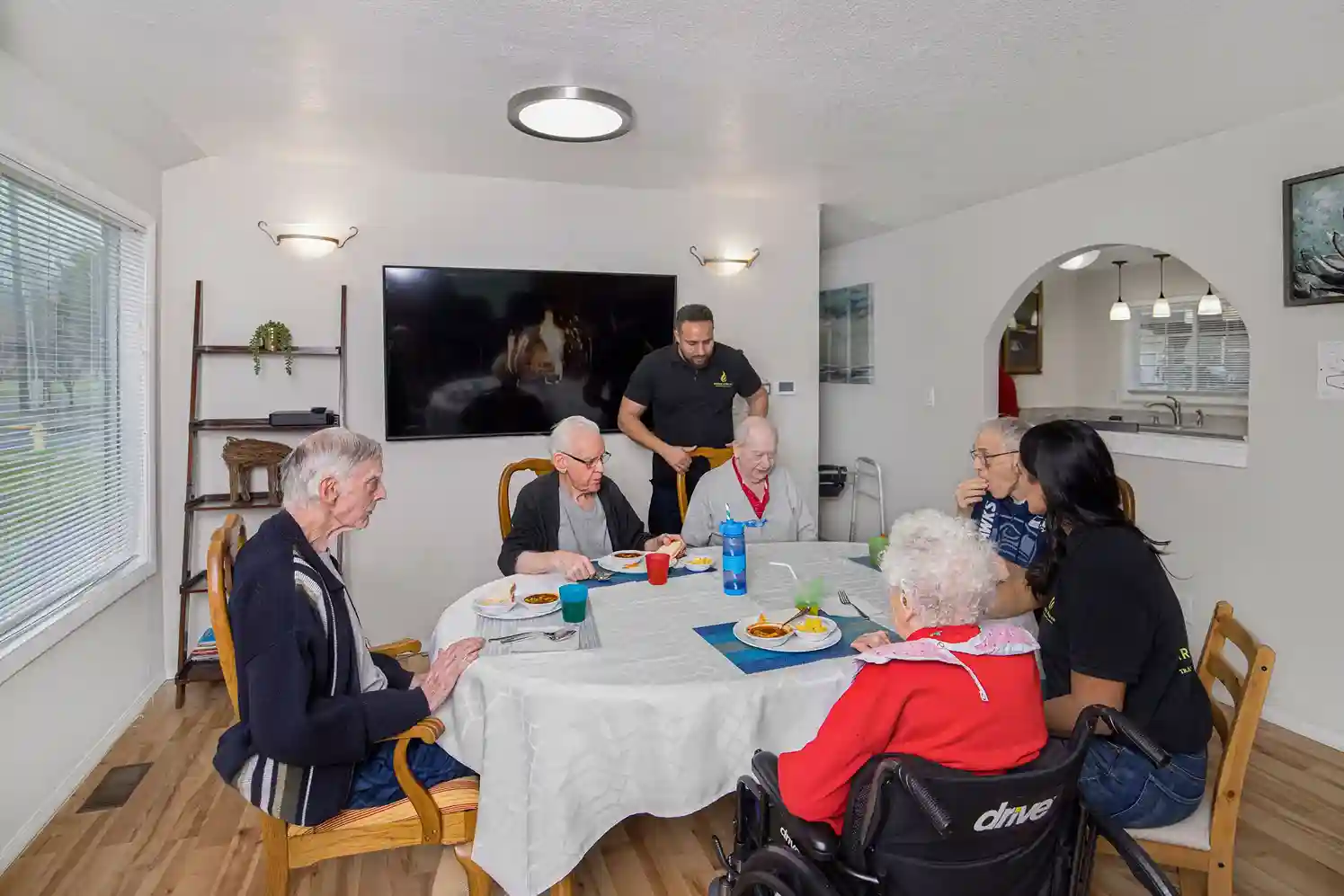 dining at caring arms of puyallup's assisted living community