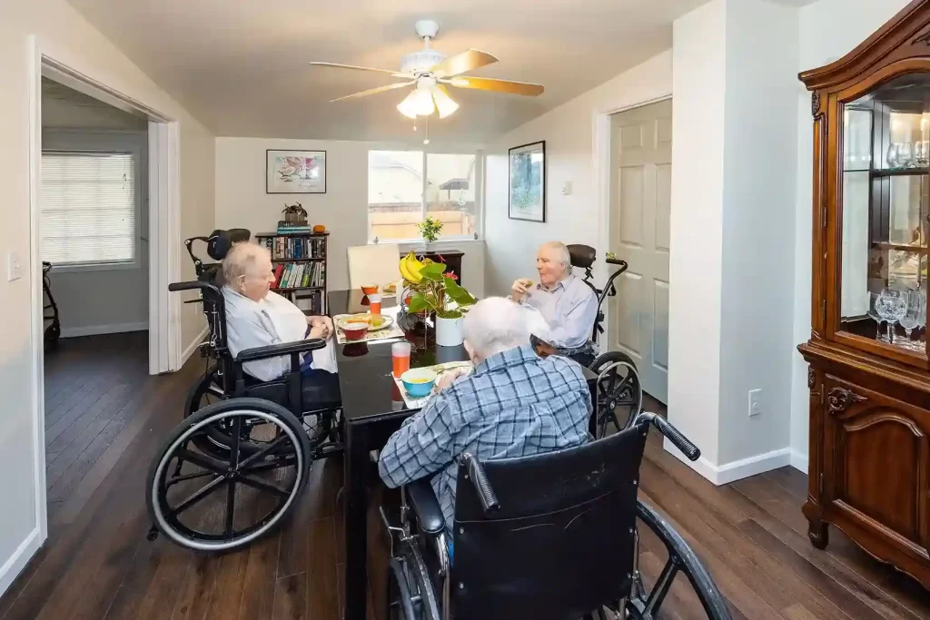 seniors sharing and eating meals together at Caring Arms Adult Family Homes in Washington seniors sharing and eating meals together at Caring Arms Adult Family Homes in Washington