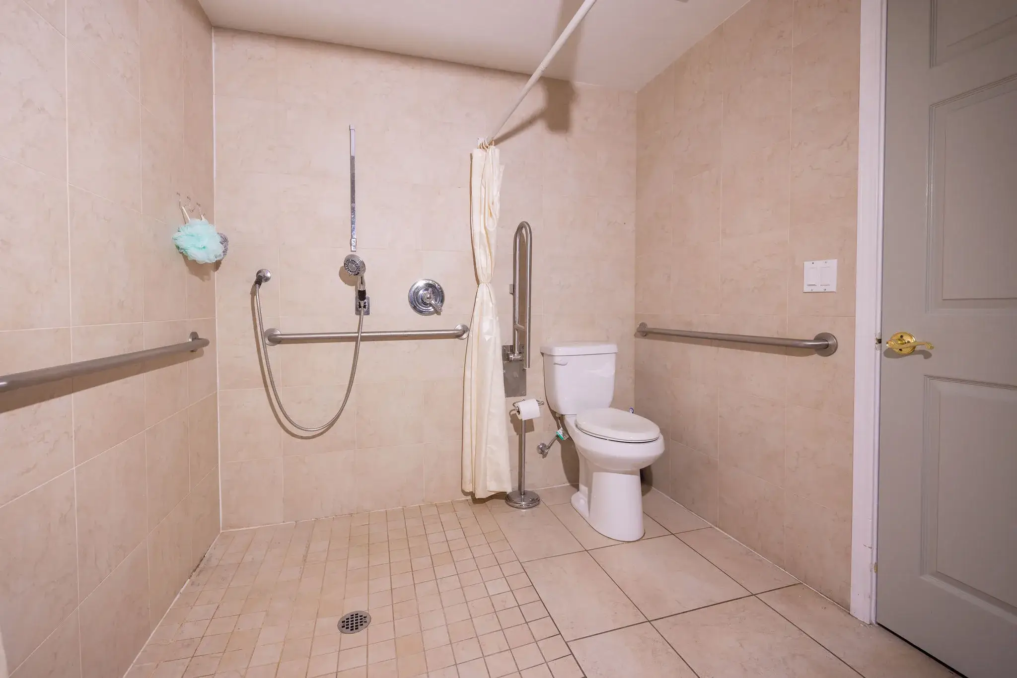 clean bathrooms at senior living community of Caring Arms in Kent