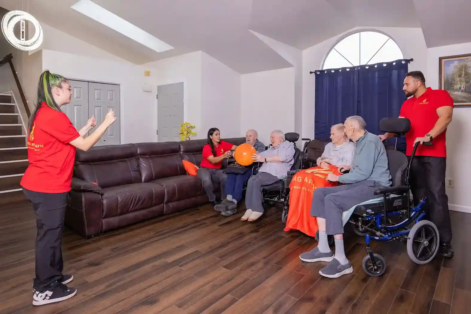 compassionate and trained caregivers and staff engaging senior residents at Kent's senior care home