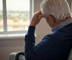 senior with demenia withdrawing from social activities