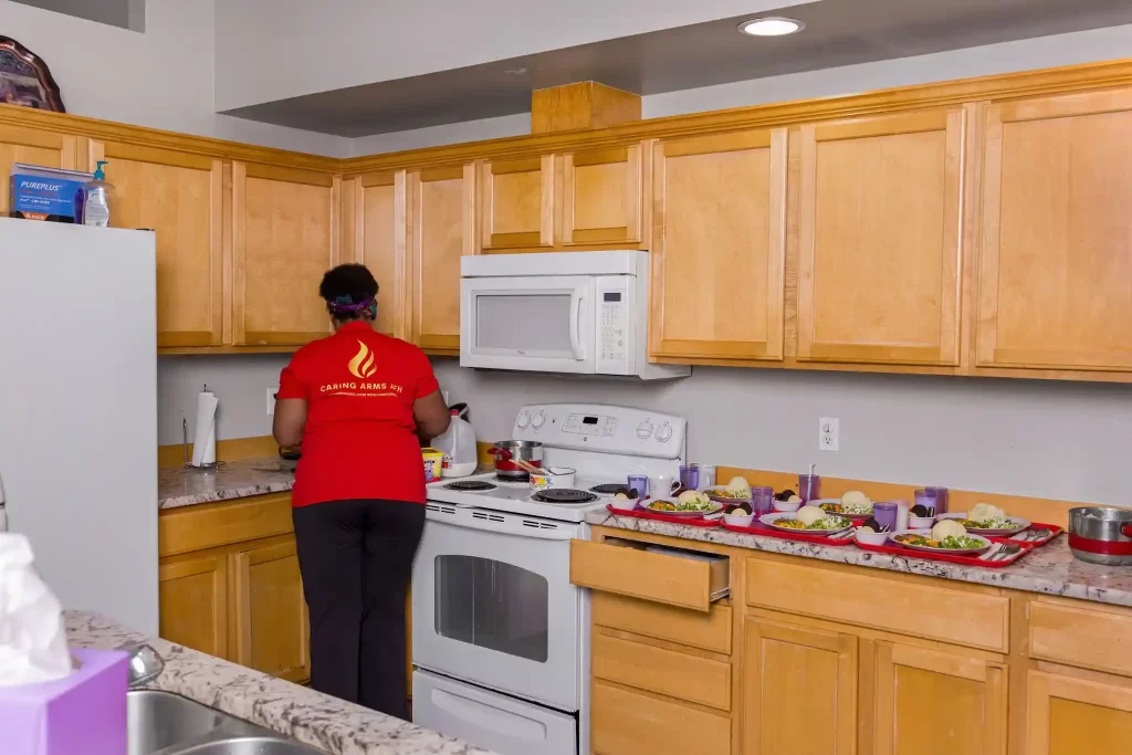 staff at caring arms adult family homes preparing fresh and nutritious meals for senior residents with dementia and alzheimers